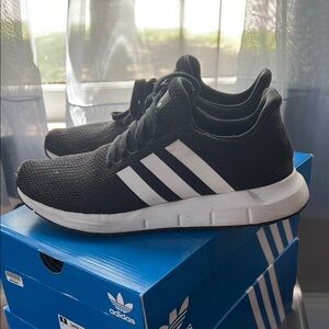 Adidas Black and White Sneakers with Sleek Athletic Design